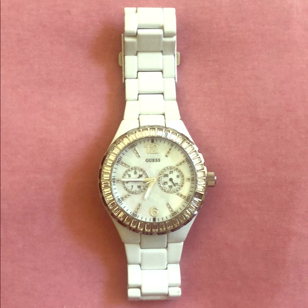 Guess Ceramic style white watch. Pearl face Date